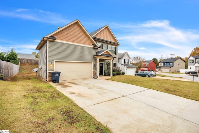 view of front of property with a front lawn and a garage