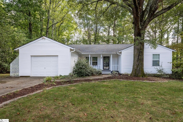 ranch-style house with a garage and a front yard