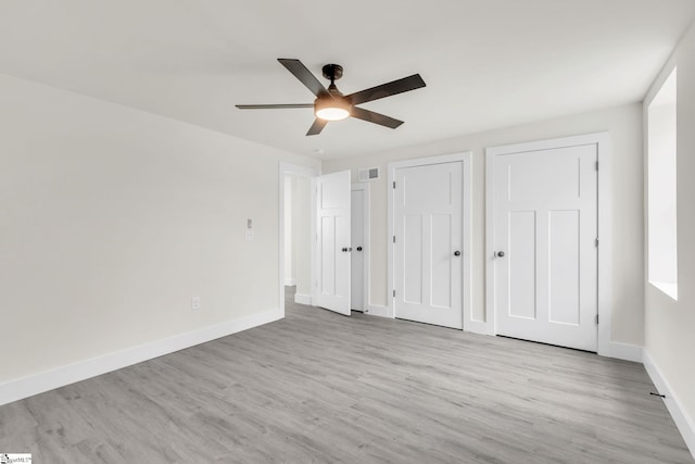 unfurnished bedroom with light hardwood / wood-style flooring and ceiling fan