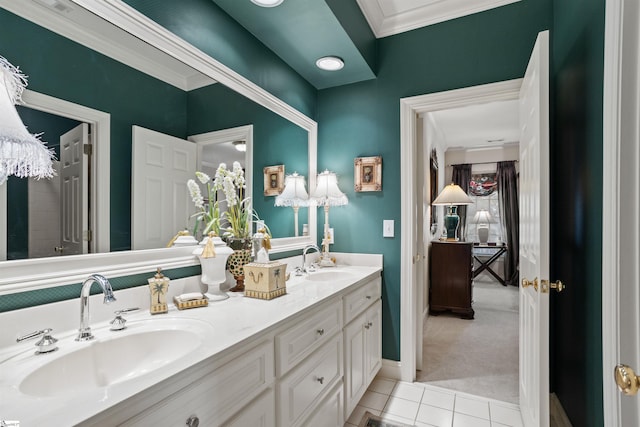 bathroom featuring vanity, tile patterned flooring, and crown molding