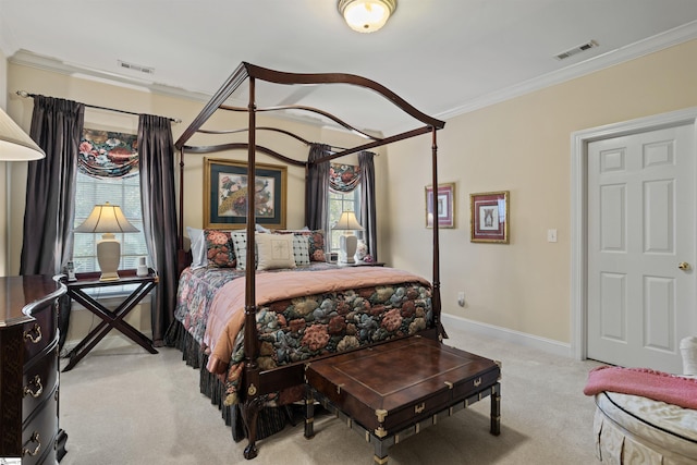 bedroom with light colored carpet and crown molding