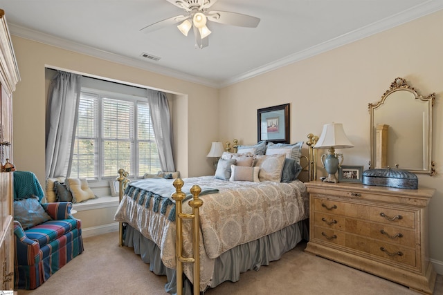 bedroom with light colored carpet, ceiling fan, and crown molding