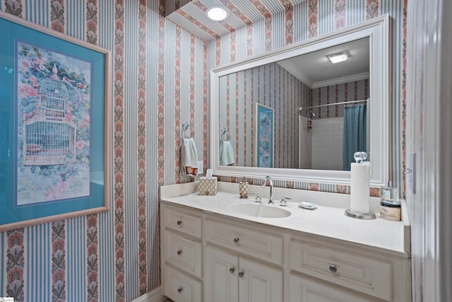 bathroom featuring vanity, crown molding, and a shower with curtain