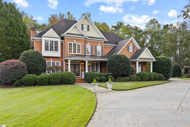 view of front of house with a front yard