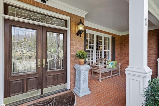 property entrance featuring a porch