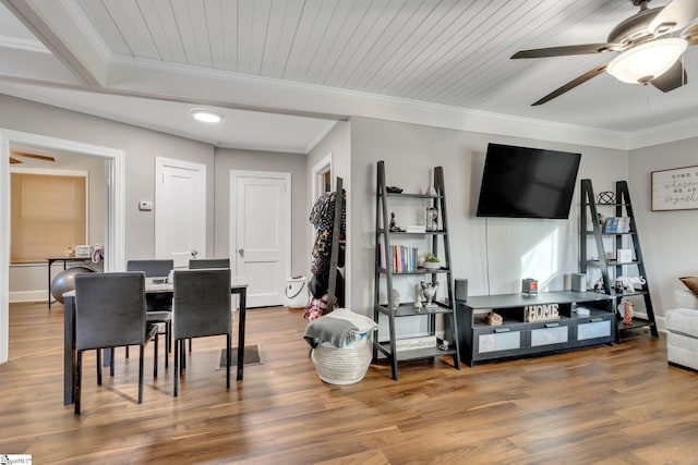 interior space featuring ceiling fan, wood ceiling, hardwood / wood-style flooring, and ornamental molding