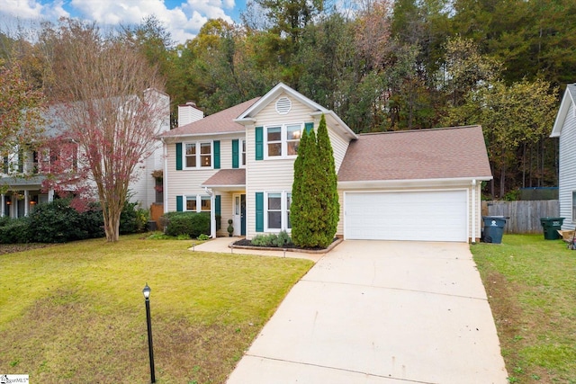 view of front facade with a garage and a front yard