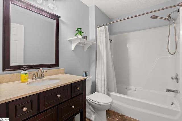 full bathroom with vanity, tile patterned flooring, toilet, a textured ceiling, and shower / tub combo