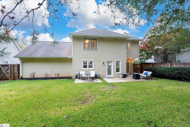 back of property with a lawn, a patio area, and outdoor lounge area