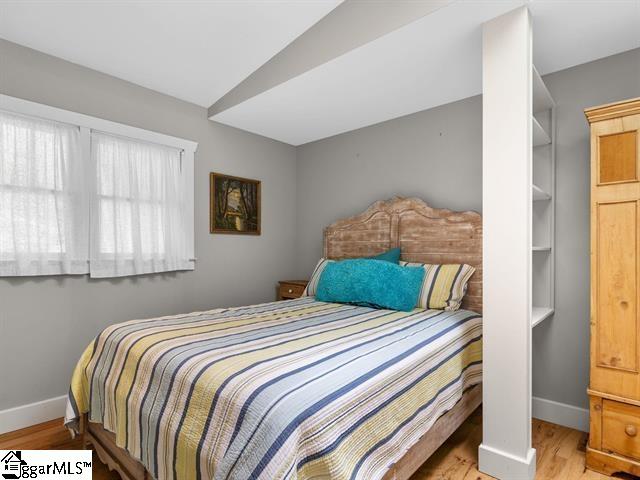 bedroom with light hardwood / wood-style floors