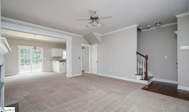 unfurnished living room with ceiling fan, carpet flooring, and crown molding