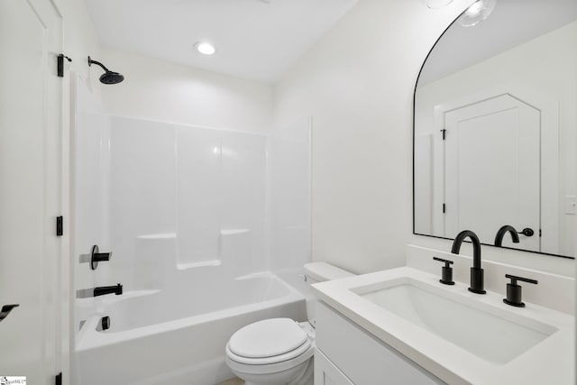 full bathroom featuring shower / bath combination, toilet, and vanity