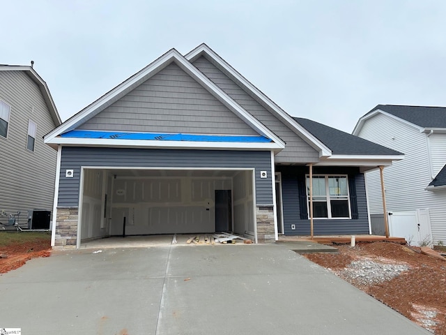 craftsman inspired home with a garage