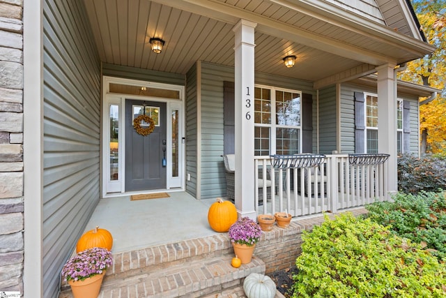 doorway to property with covered porch