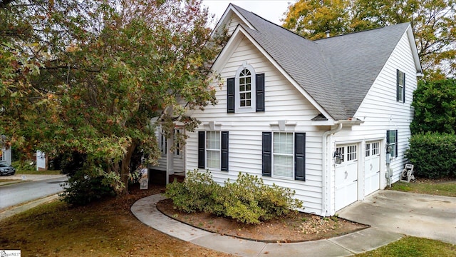 view of front of property with a garage