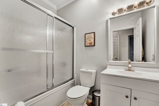 full bathroom with toilet, vanity, shower / bath combination with glass door, and crown molding