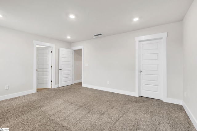 empty room featuring carpet floors