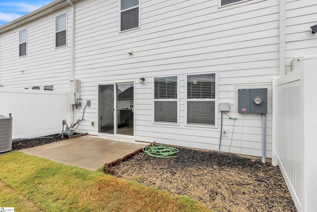 rear view of property featuring a patio area