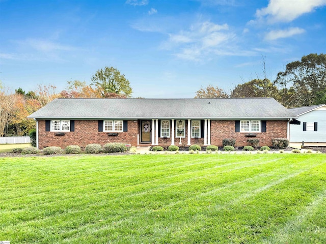 ranch-style house with a front yard