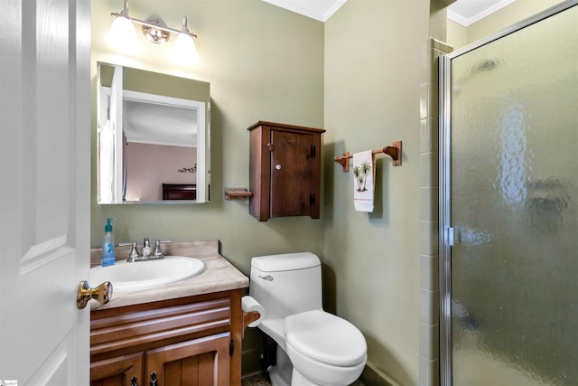 bathroom featuring walk in shower, toilet, vanity, and crown molding