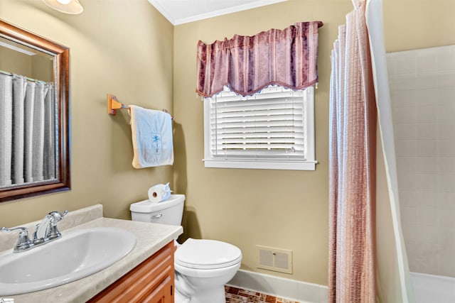 bathroom featuring toilet, vanity, curtained shower, and crown molding