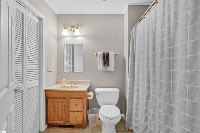 bathroom with ornamental molding, walk in shower, vanity, tile patterned flooring, and toilet