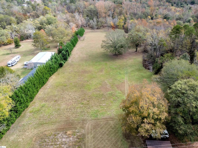 birds eye view of property with a rural view