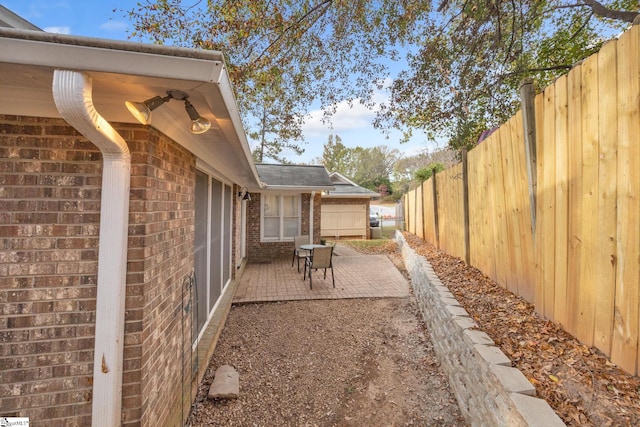 view of yard featuring a patio