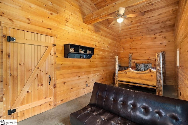 bedroom featuring ceiling fan, wooden walls, carpet floors, and beam ceiling