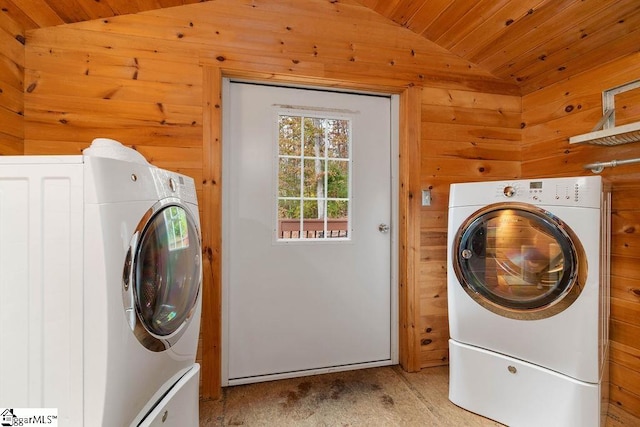 laundry area featuring wood walls and wooden ceiling