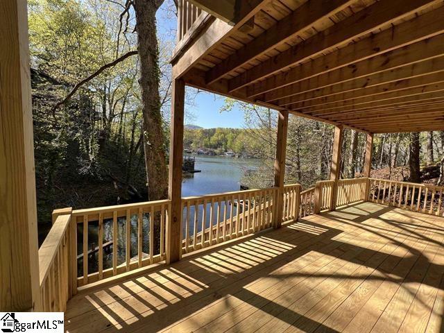 deck featuring a water view