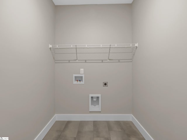 washroom featuring hardwood / wood-style floors, washer hookup, and electric dryer hookup