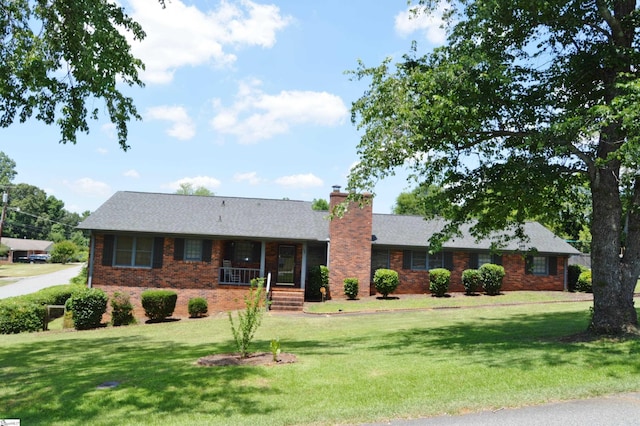 ranch-style house with a front yard