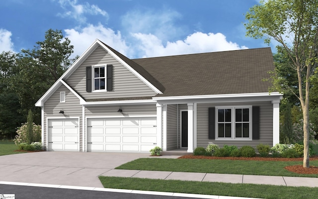 view of front of house featuring a garage and a front yard