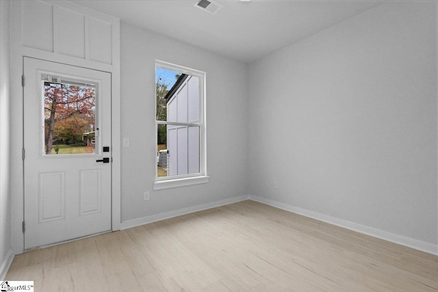 interior space with a healthy amount of sunlight and light wood-type flooring