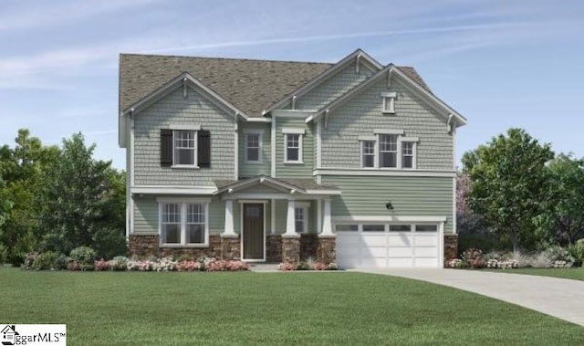 view of front of house with a garage and a front yard