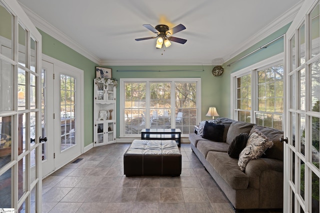 sunroom / solarium with french doors and ceiling fan