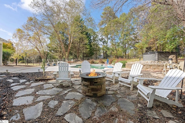 view of patio featuring an outdoor fire pit