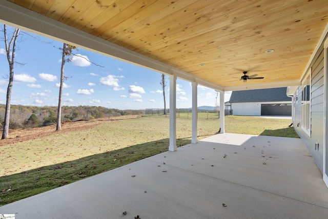 view of patio featuring a rural view and ceiling fan