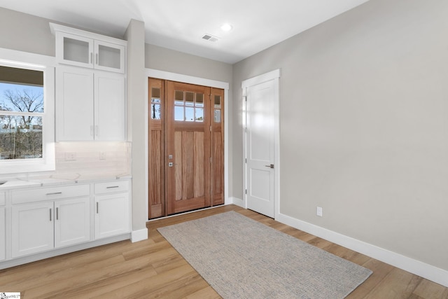 foyer featuring light hardwood / wood-style floors