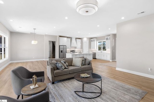 living room featuring light wood-type flooring