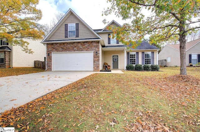 225 Worcester Ln, Easley, SC 29642 - traditional-style house with an attached garage, driveway, stone siding, and a front yard