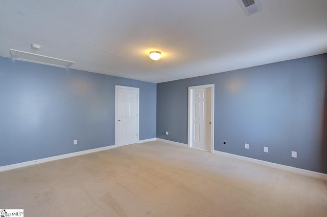 225 Worcester Ln, Easley, SC 29642 - empty room featuring attic access, baseboards, and light colored carpet