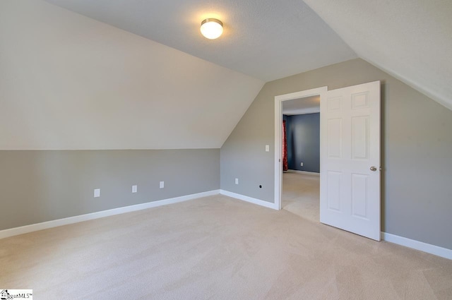 225 Worcester Ln, Easley, SC 29642 - bonus room featuring light colored carpet, lofted ceiling, and baseboards