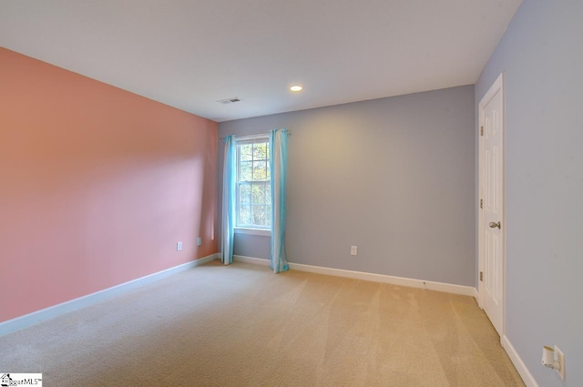 view of carpeted spare room