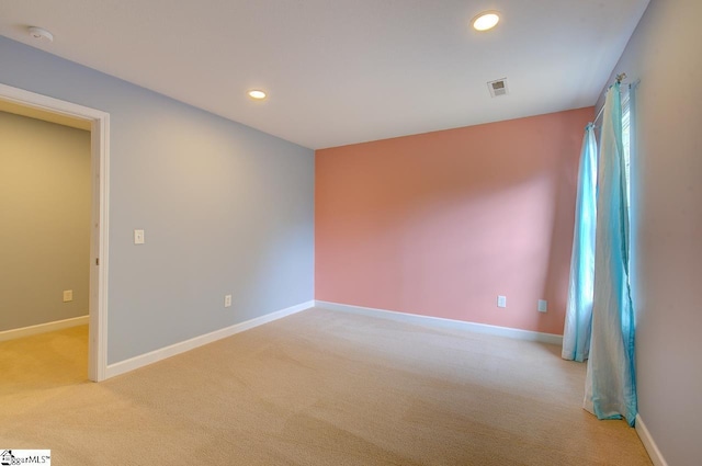 225 Worcester Ln, Easley, SC 29642 - empty room with light colored carpet, recessed lighting, baseboards, and a smoke detector