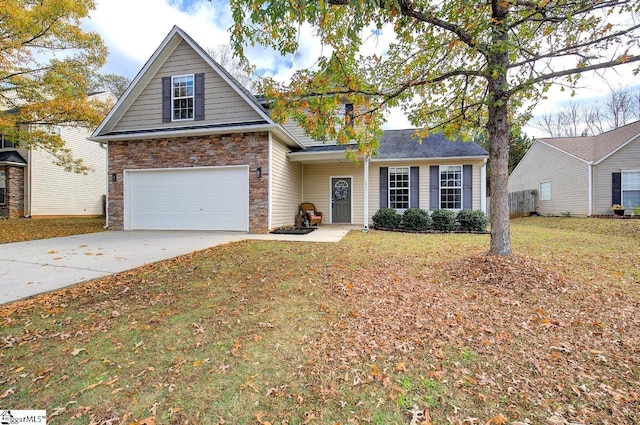 225 Worcester Ln, Easley, SC 29642 - traditional home with concrete driveway, a garage, a front yard, and stone siding