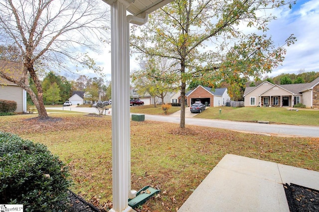 225 Worcester Ln, Easley, SC 29642 - view of grassy yard featuring a detached garage and a residential view