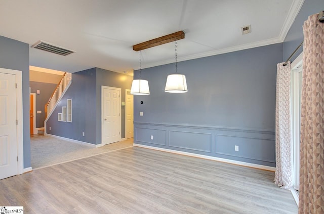 225 Worcester Ln, Easley, SC 29642 - spare room featuring light wood-style flooring, stairs, crown molding, and baseboards