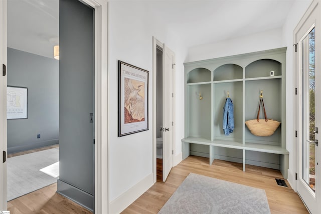 mudroom featuring wood-type flooring